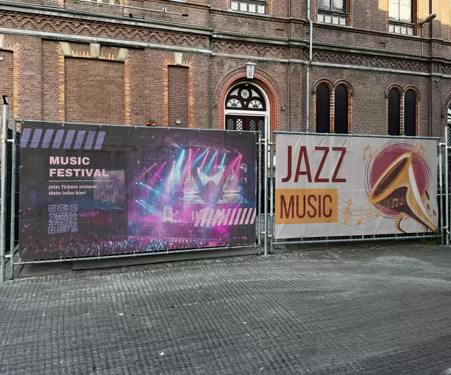 Bauzaunbanner als Werbebanner für Musikveranstaltungen